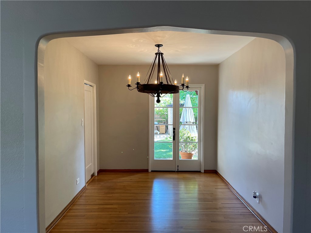 2658 San Marcos Drive Pasadena, CA 91107 - Photo 6 of 19 a view of a hallway with wooden floor and chandelier