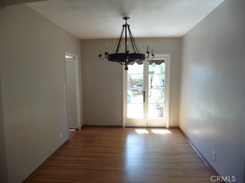 2658 San Marcos Drive Pasadena, CA 91107 - Photo 8 of 19 a view of a room with wooden floor wooden floor and windows