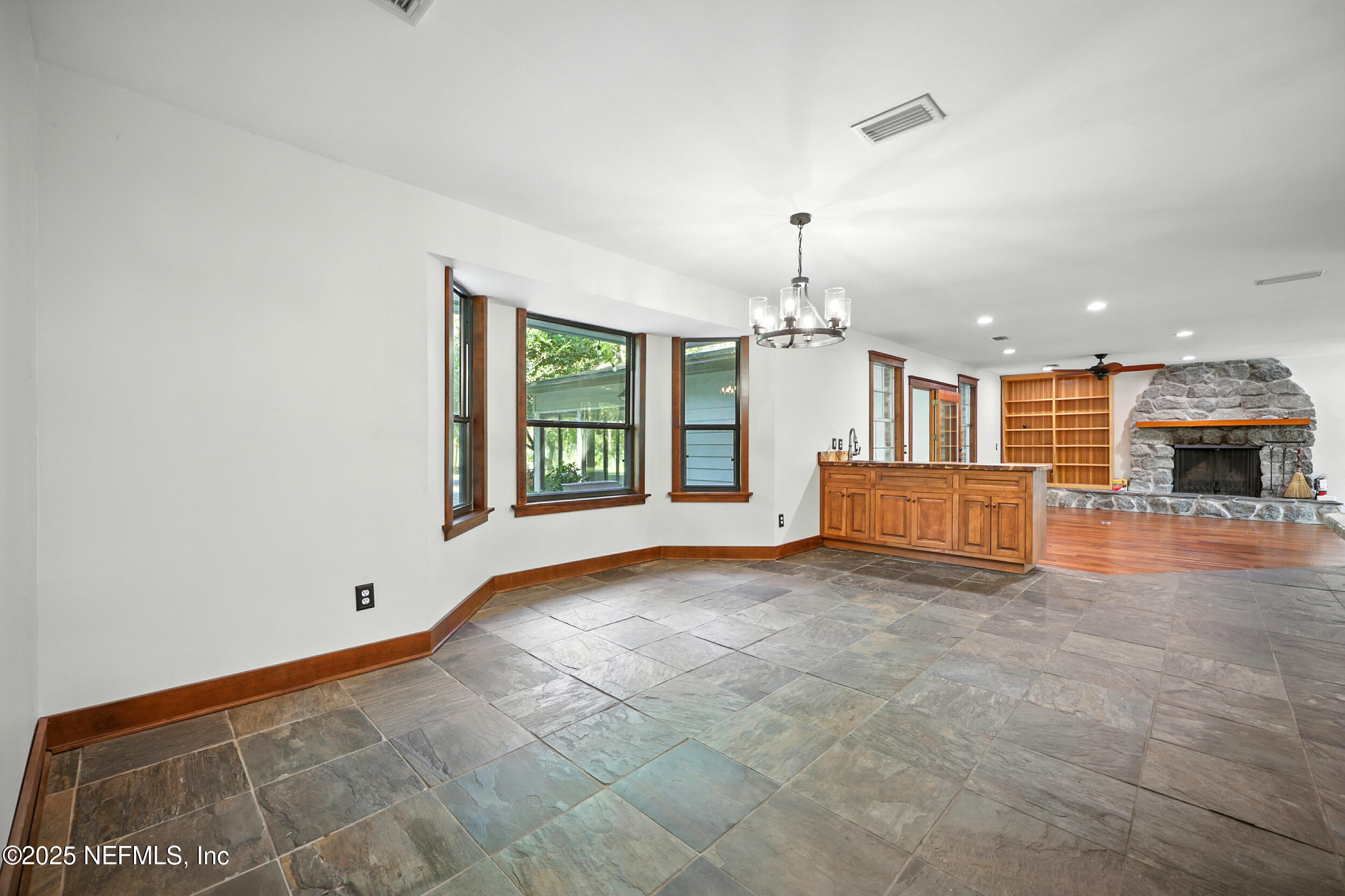 12534 Flynn Road Jacksonville, FL 32223 - Photo 17 of 90 a view of a kitchen with a sink and a window
