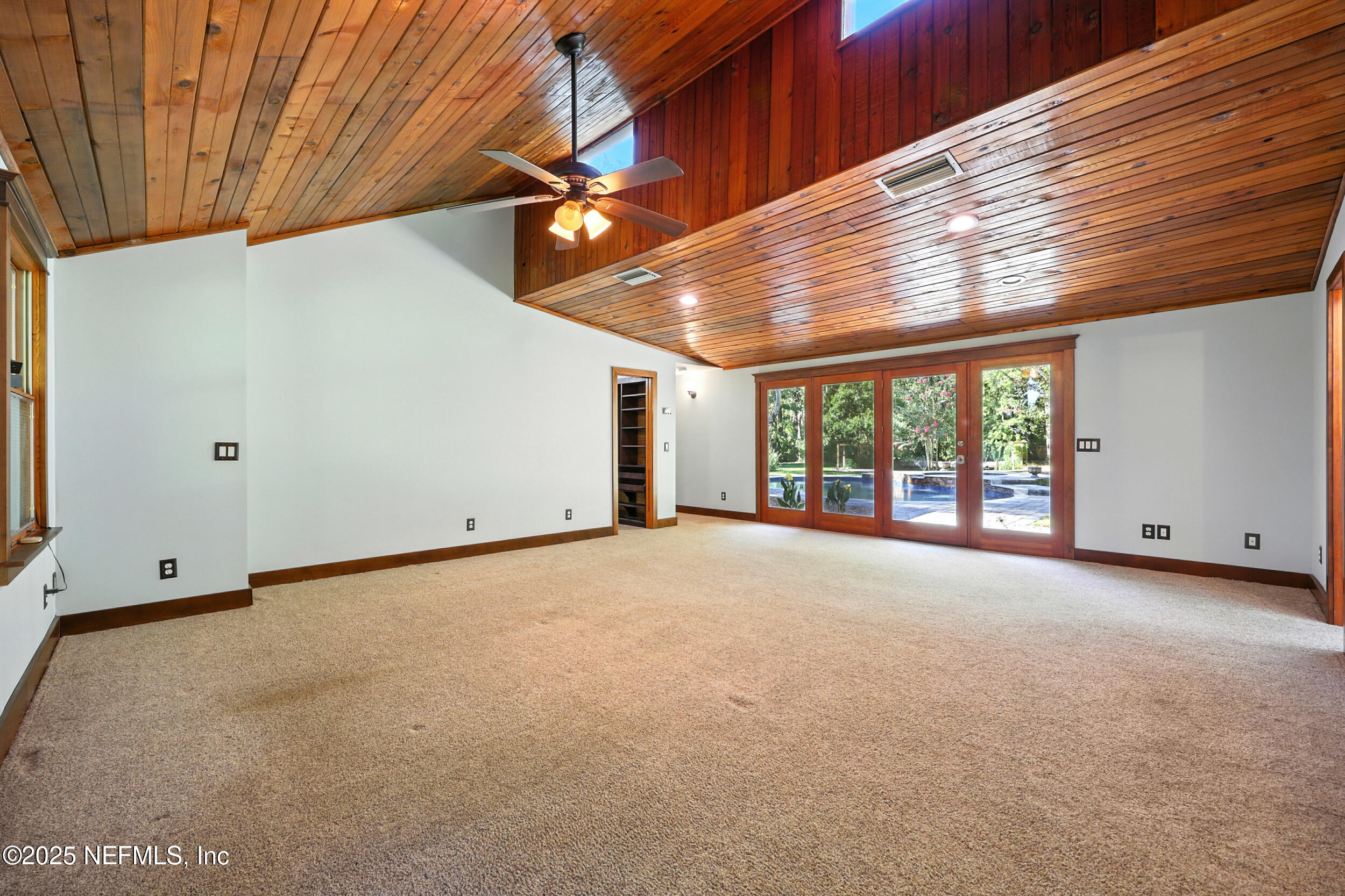 12534 Flynn Road Jacksonville, FL 32223 - Photo 22 of 90 a view of an empty room with a window