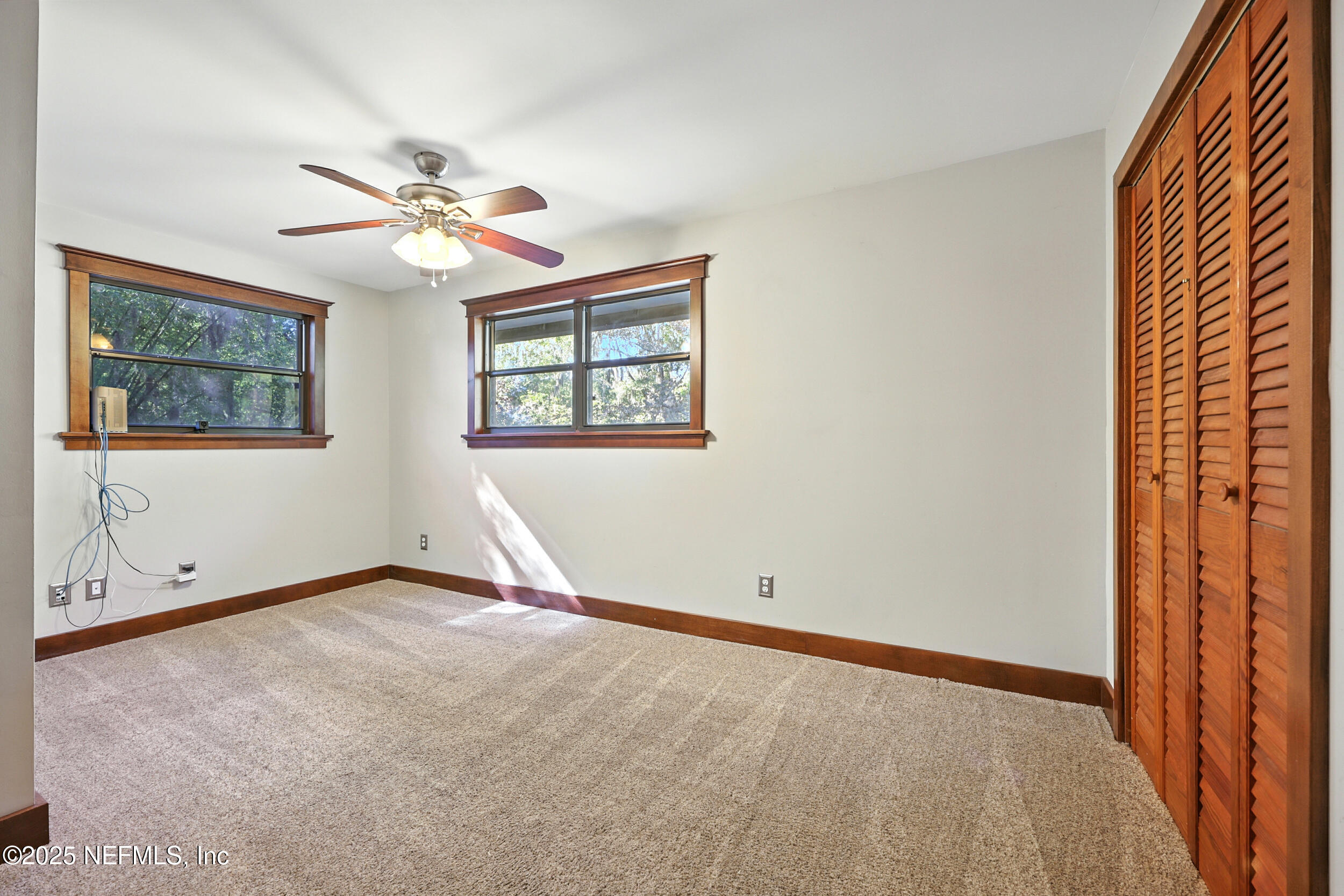 12534 Flynn Road Jacksonville, FL 32223 - Photo 29 of 90 a view of an empty room with a window