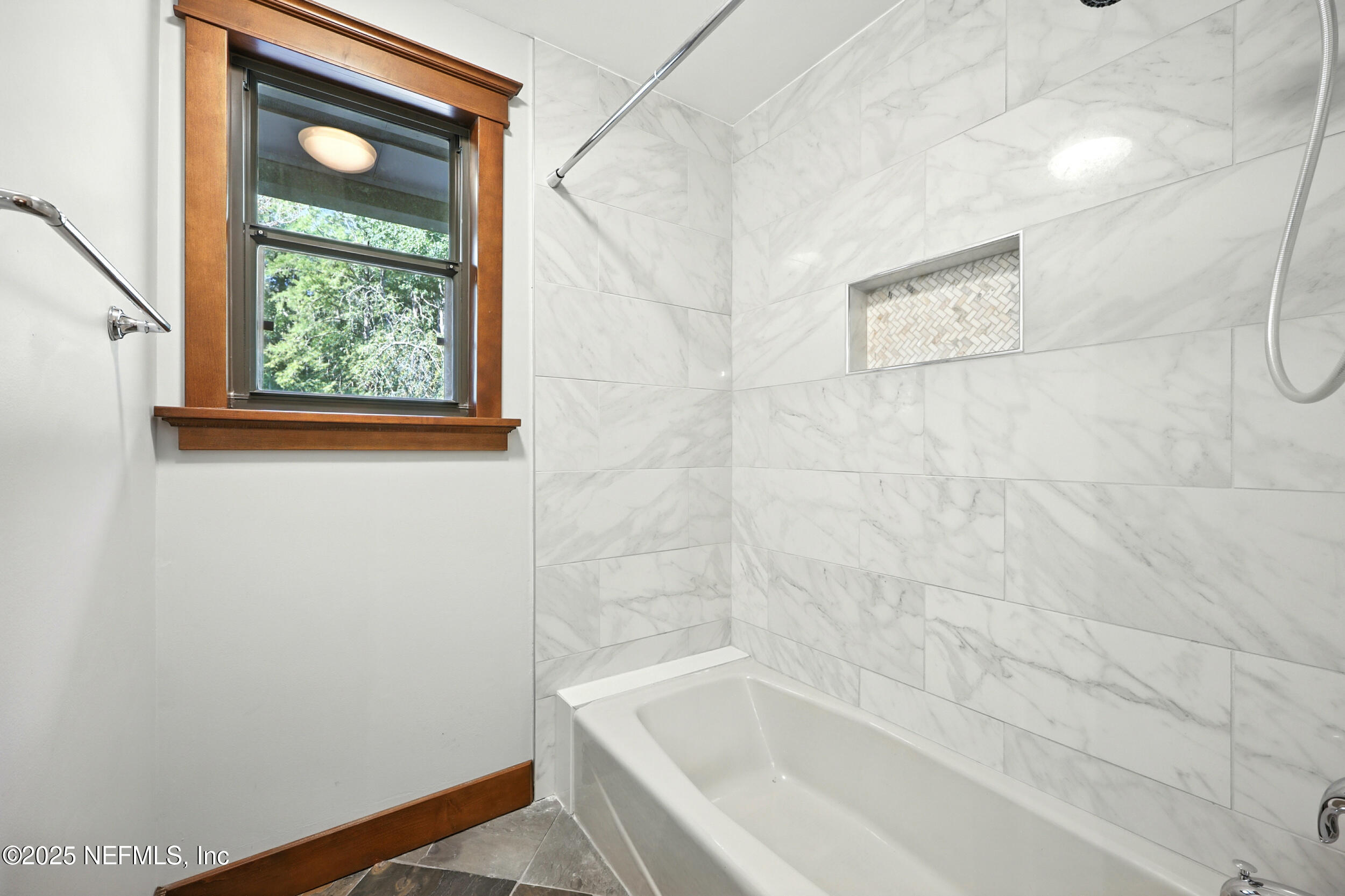 12534 Flynn Road Jacksonville, FL 32223 - Photo 34 of 90 a white bath tub sitting next to a shower