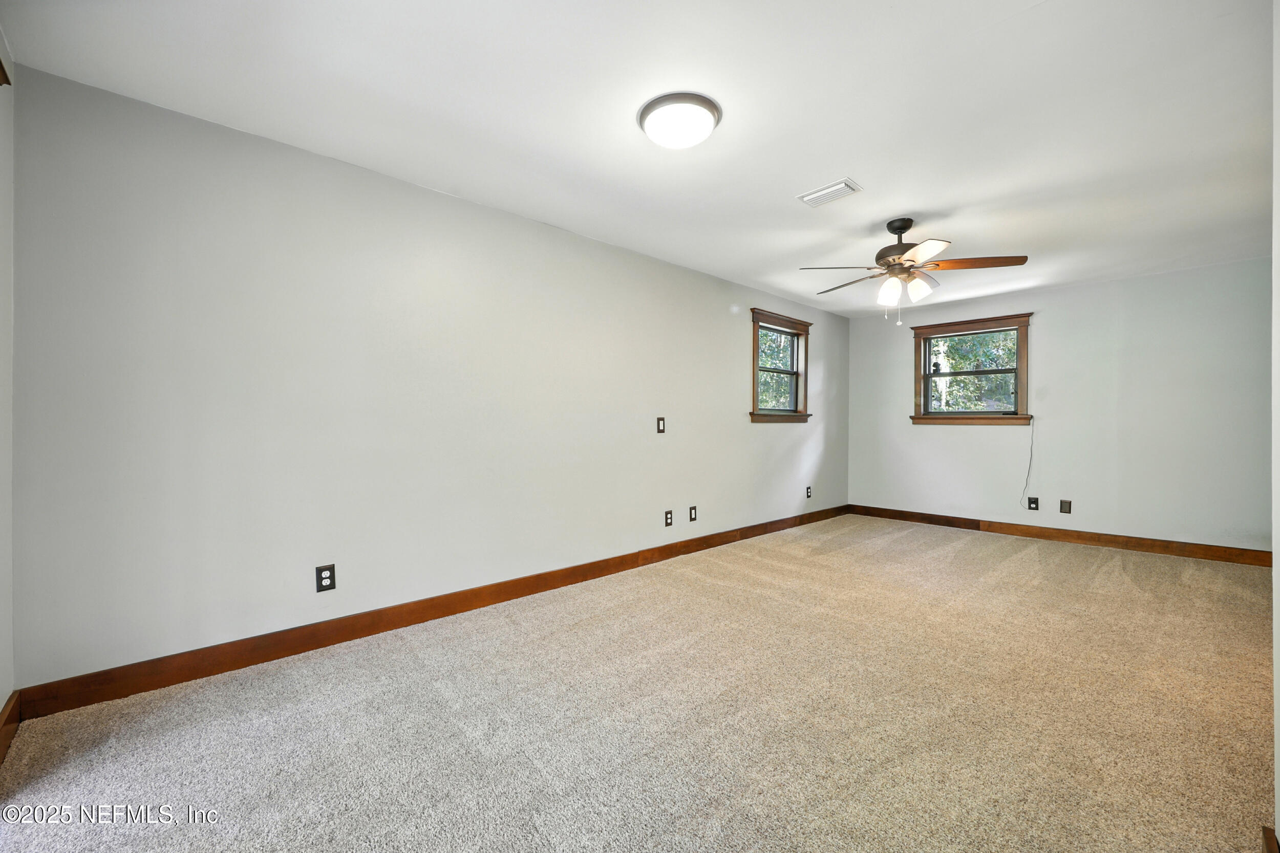 12534 Flynn Road Jacksonville, FL 32223 - Photo 36 of 90 a view of an empty room with a window