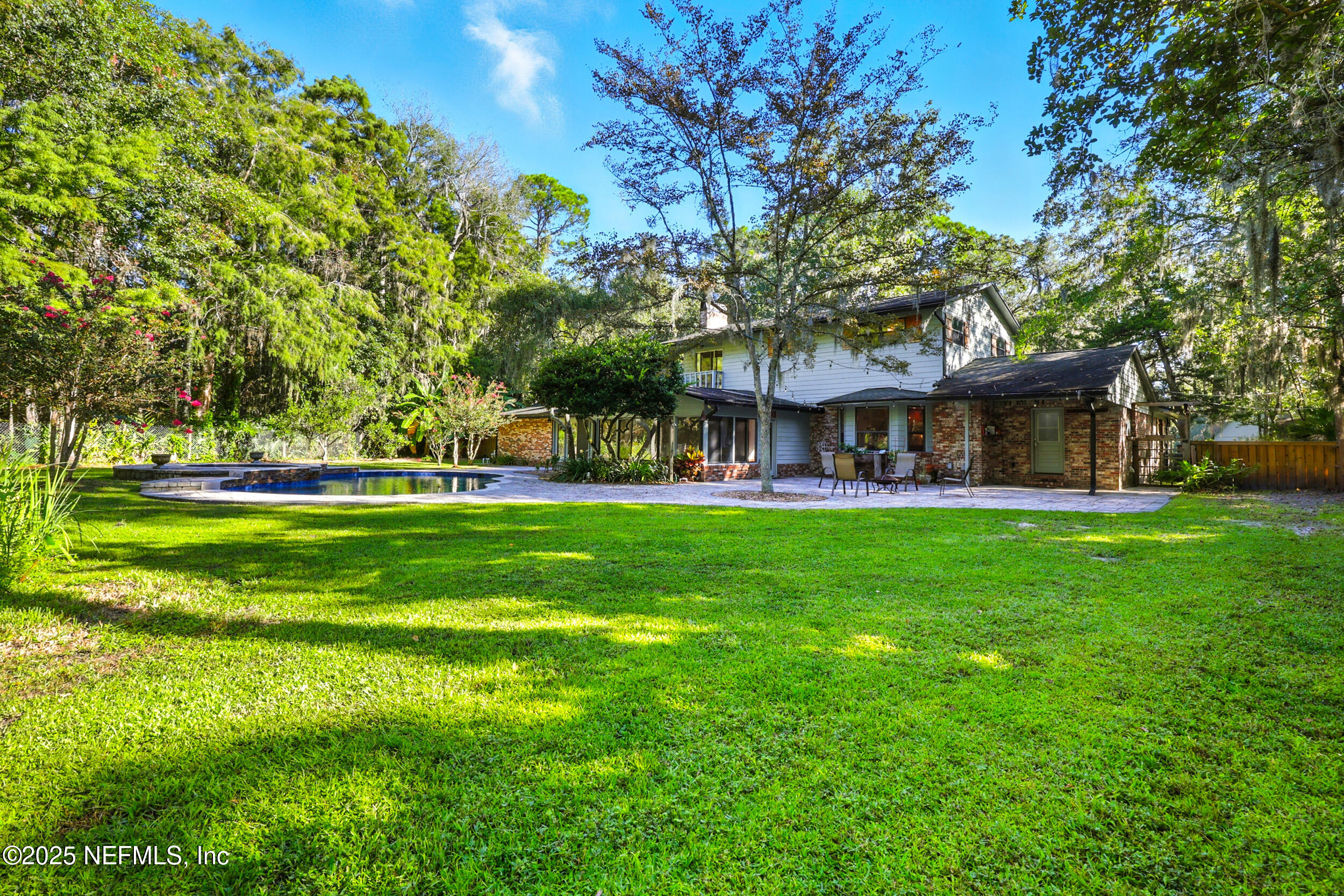 12534 Flynn Road Jacksonville, FL 32223 - Photo 50 of 90 a view of a house with a big yard
