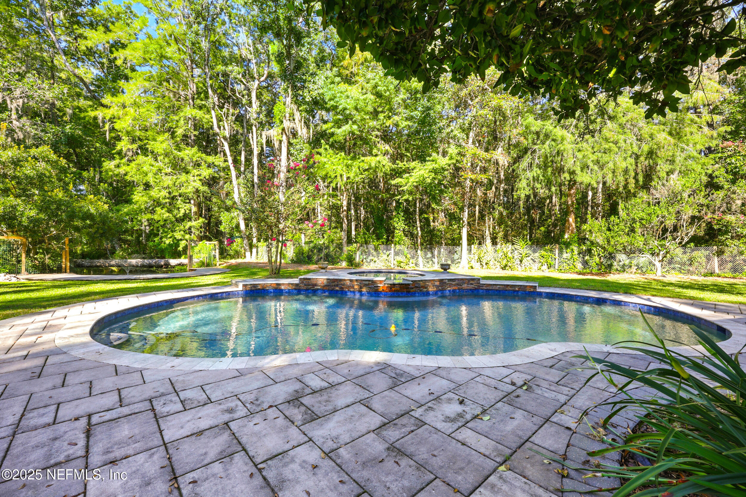 12534 Flynn Road Jacksonville, FL 32223 - Photo 54 of 90 a view of swimming pool with deck and yard
