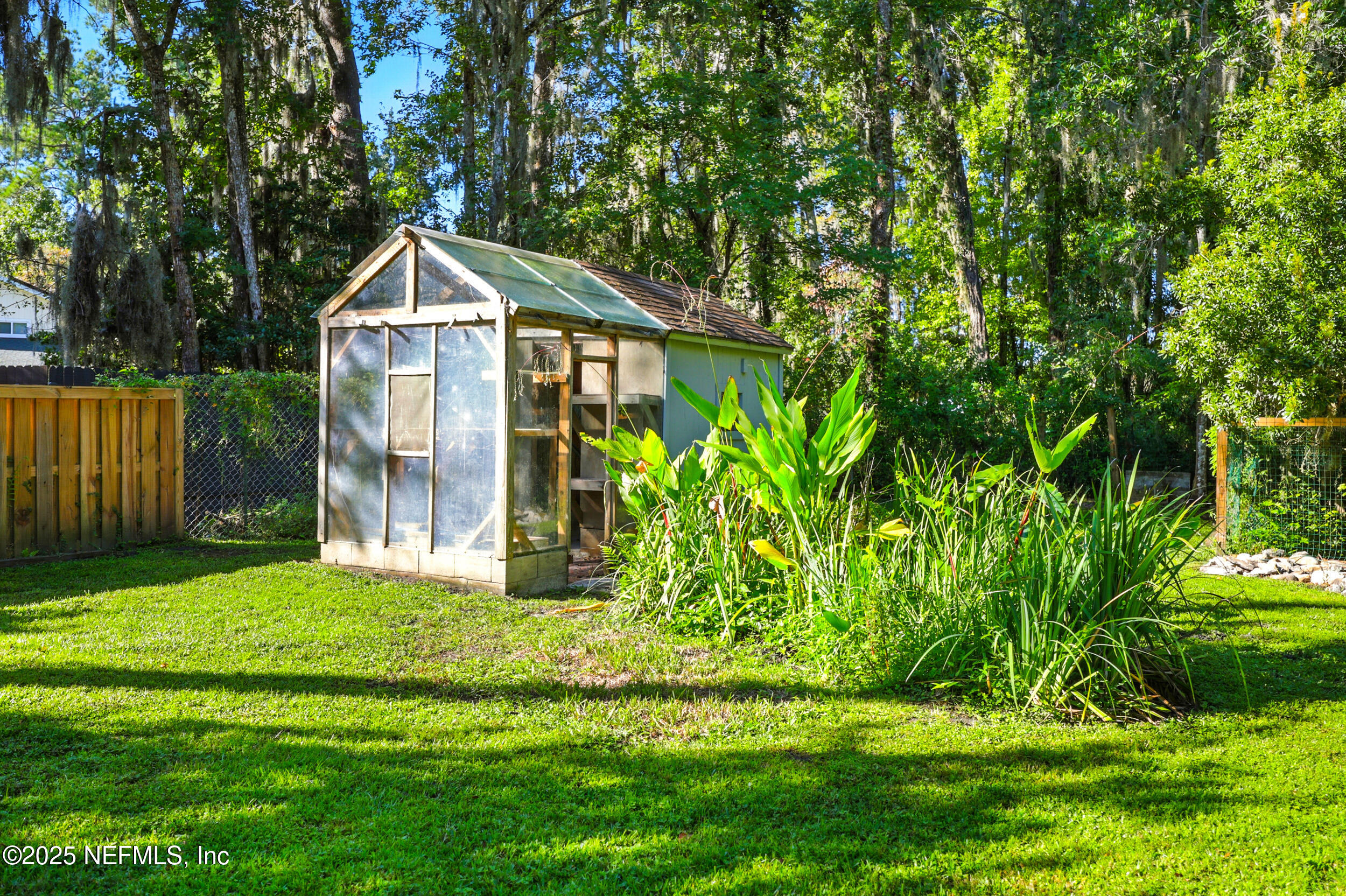 12534 Flynn Road Jacksonville, FL 32223 - Photo 60 of 90 a view of a yard in front of house