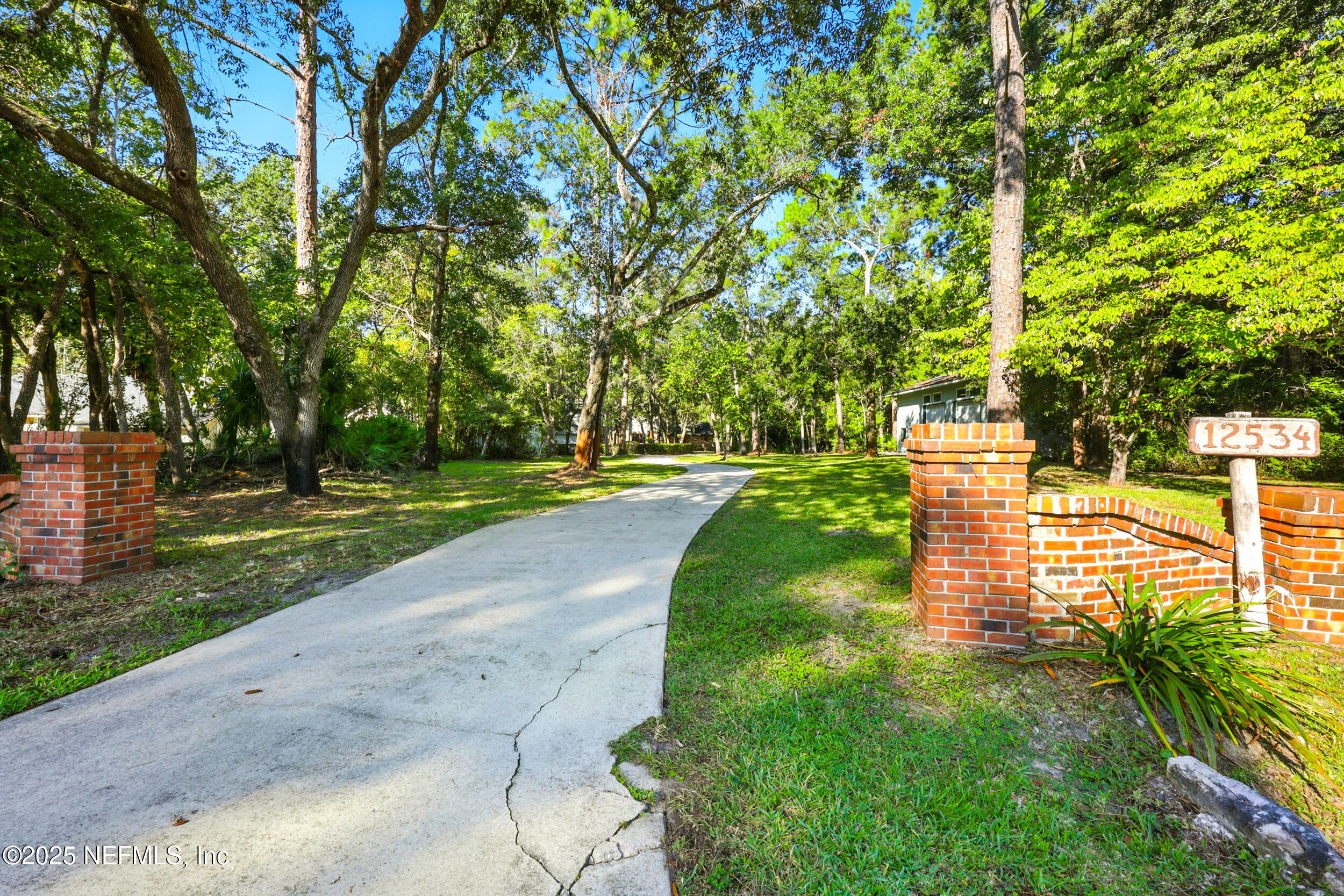 12534 Flynn Road Jacksonville, FL 32223 - Photo 74 of 90 a view of a park with large trees