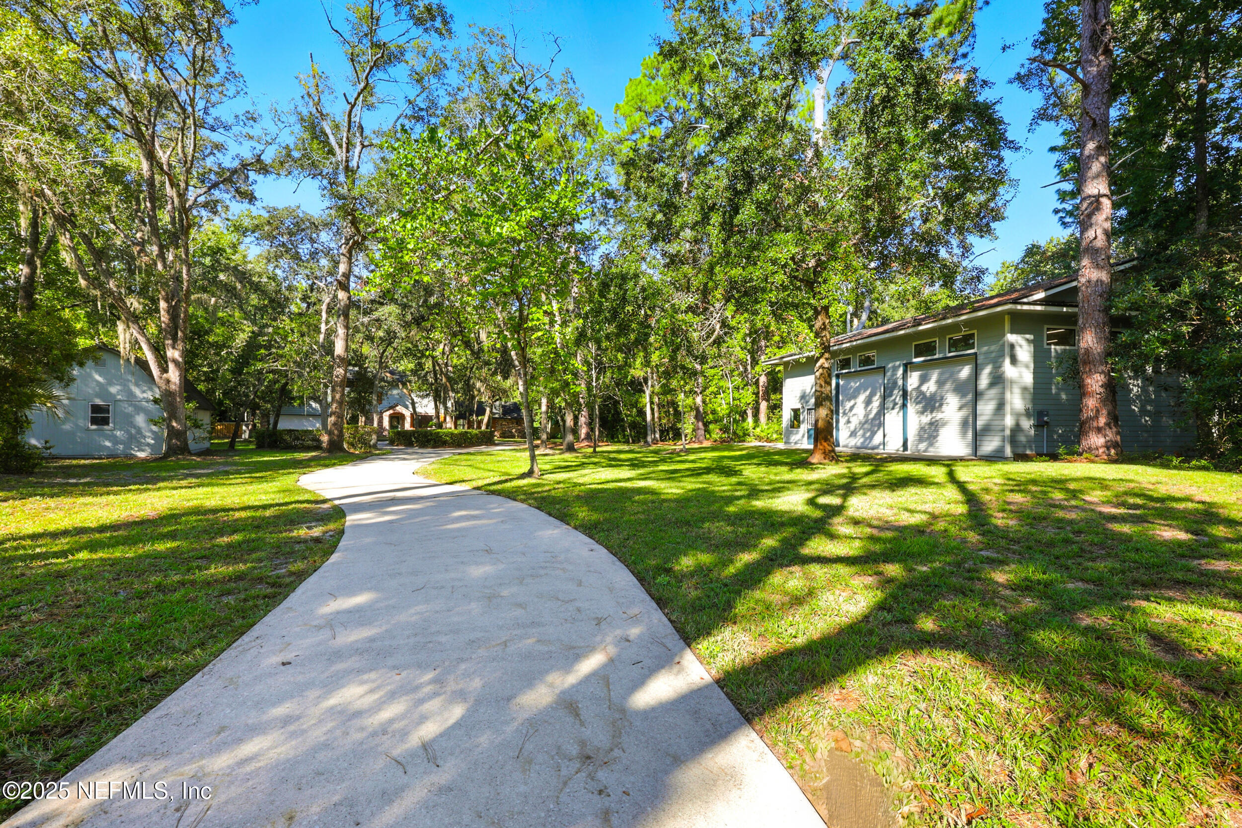 12534 Flynn Road Jacksonville, FL 32223 - Photo 75 of 90 a view of swimming pool with a yard