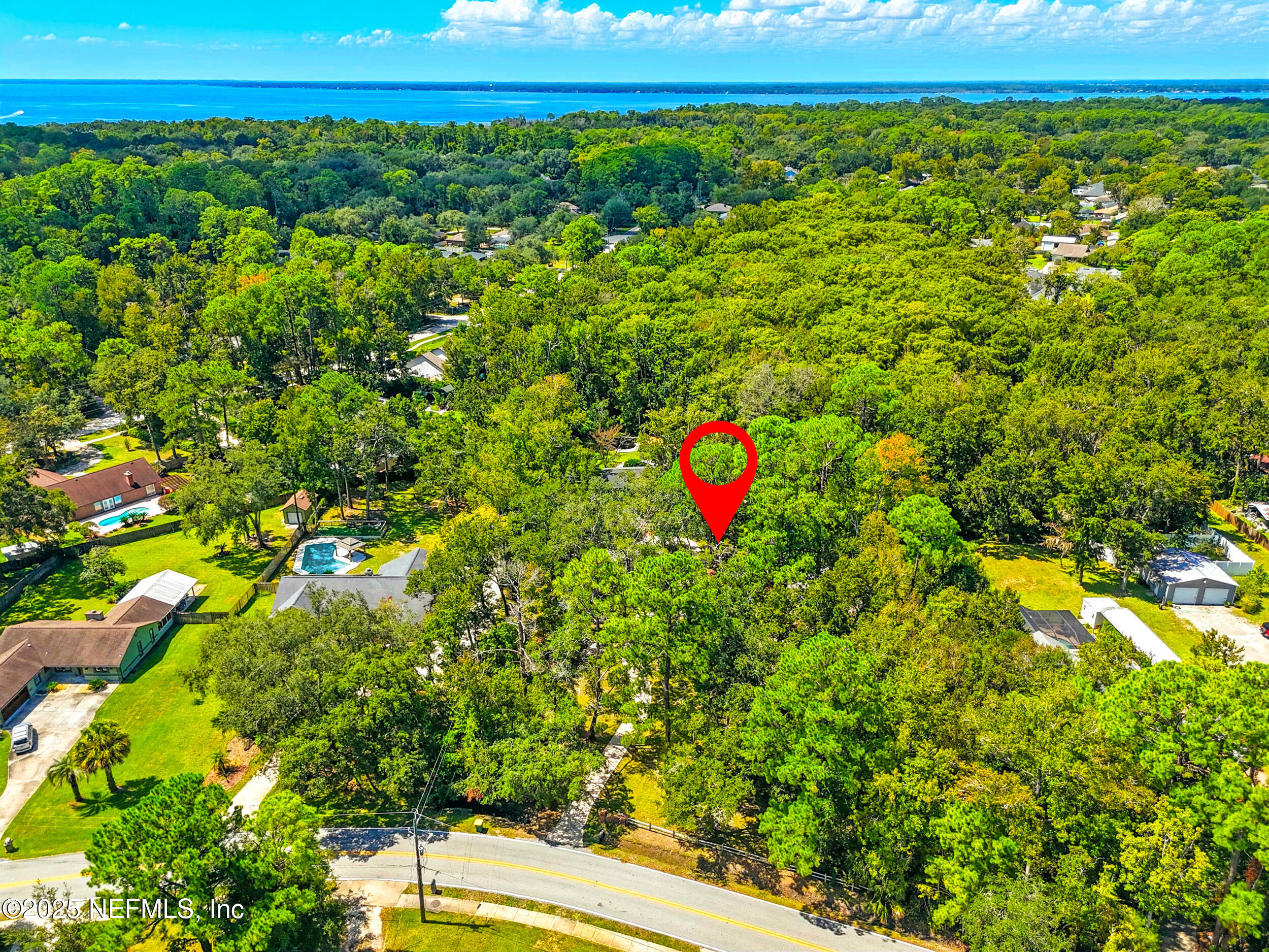 12534 Flynn Road Jacksonville, FL 32223 - Photo 79 of 90 a view of a yard with an outdoor space