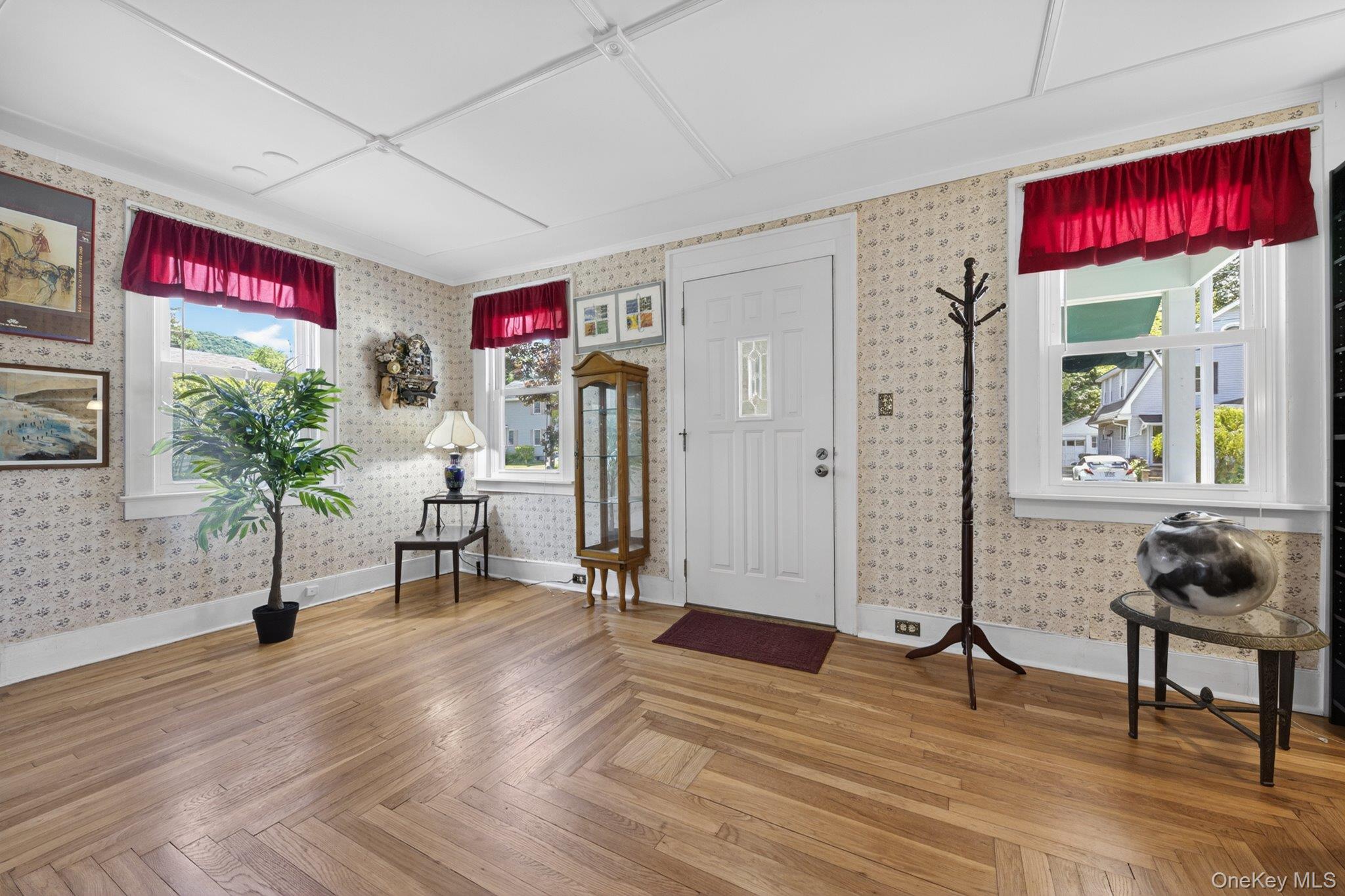 250 Rombout Avenue Beacon, NY 12508 - Photo 5 of 33 a living room with furniture and a potted plant