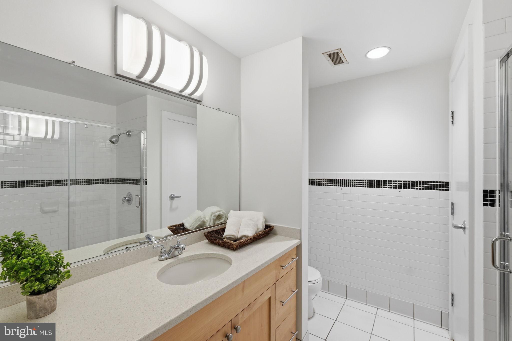 809 6th Street Northwest, Unit 22 Washington, DC 20001 - Photo 13 of 21 Bath 1 with walk in shower