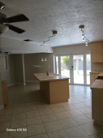 a large room with kitchen