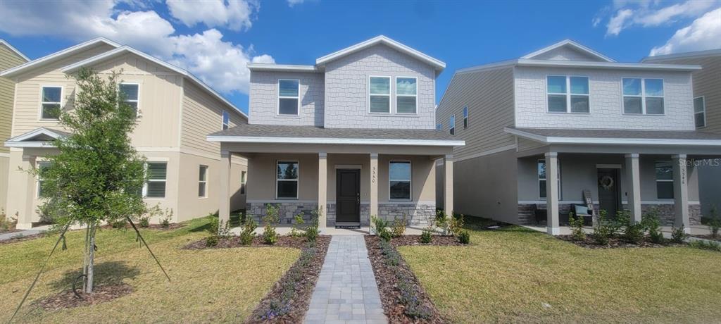 a front view of a house with a porch