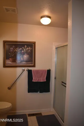 a bathroom with a toilet and a sink