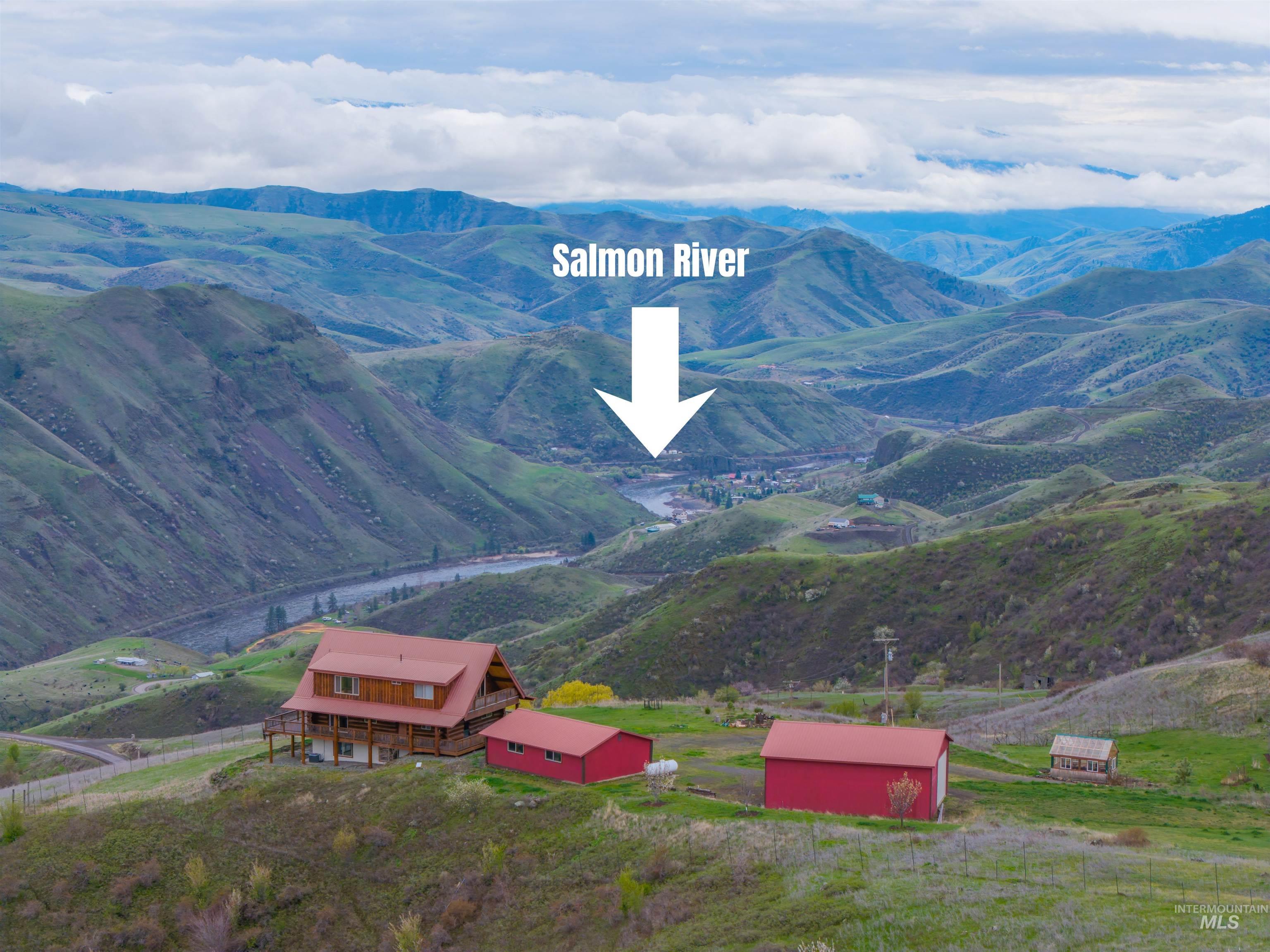 View of mountain backdrop featuring rural landscape