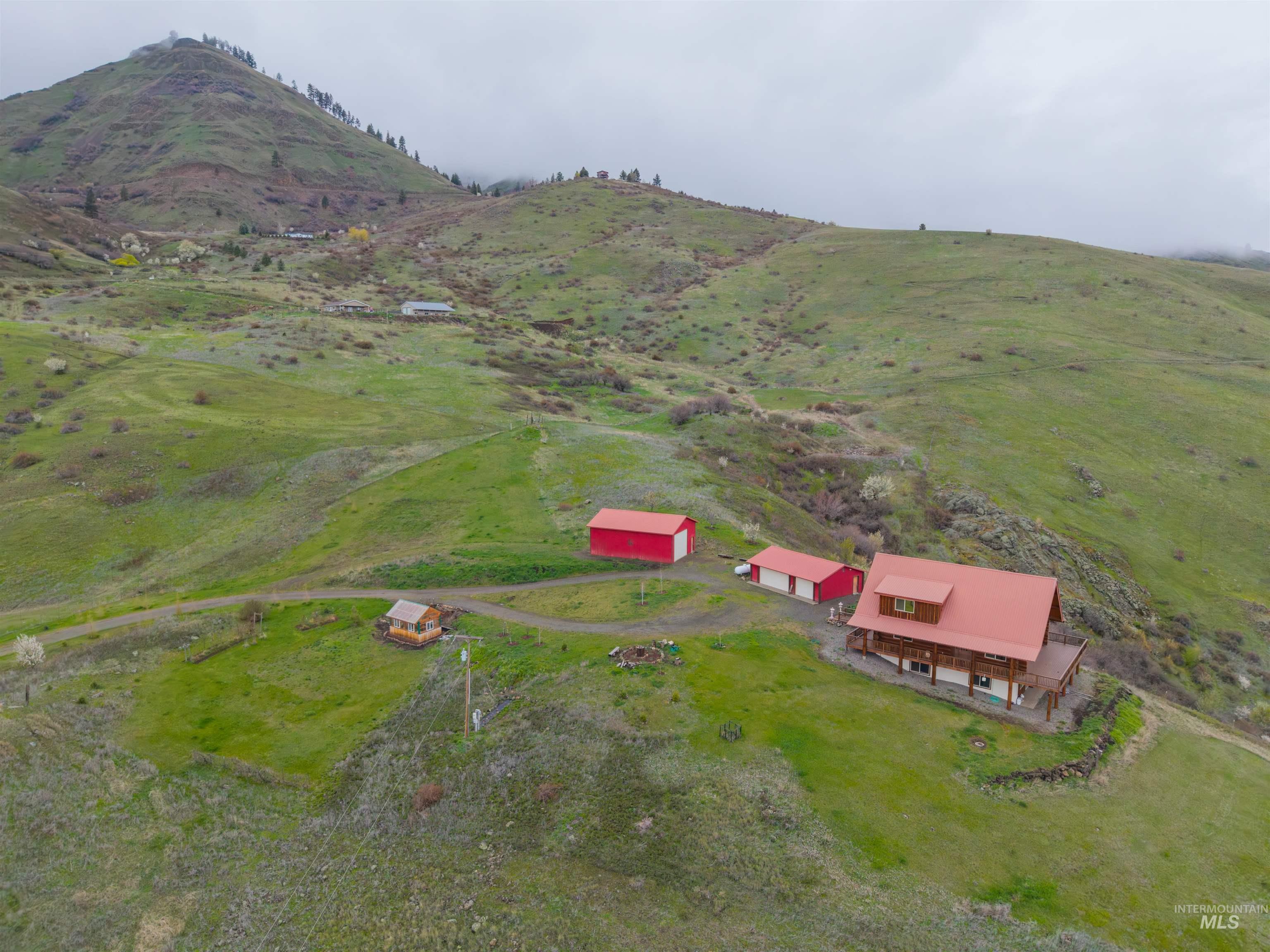 915 Doumecq Road White Bird, ID 83554 - Photo 49 of 49 Aerial overview of property's location with mountains and rural landscape