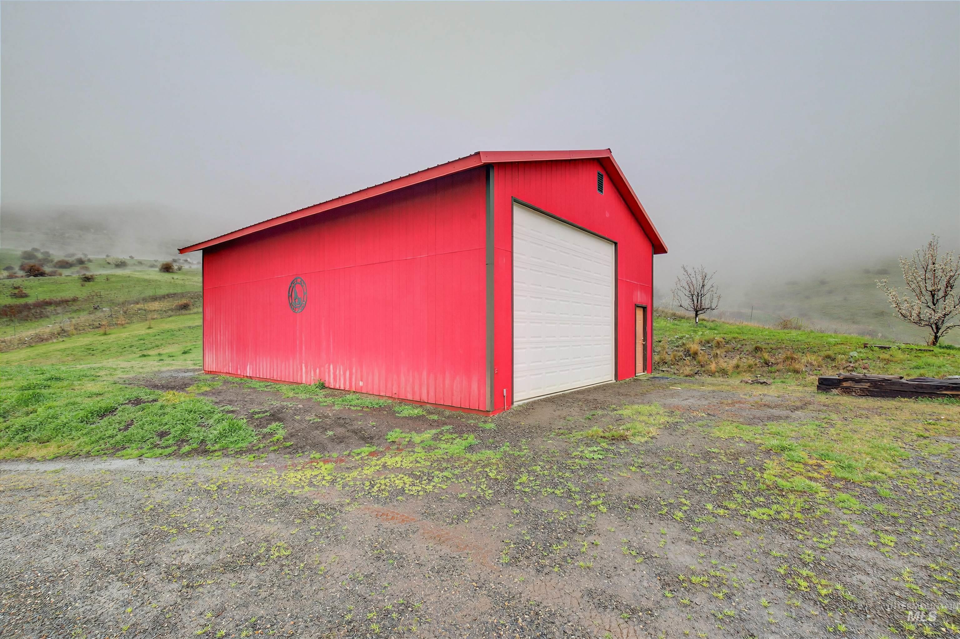 915 Doumecq Road White Bird, ID 83554 - Photo 9 of 49 View of outdoor structure with driveway