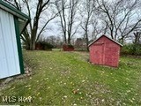 6530 Branch Road Medina, OH 44256 - Photo 33 of 35 View of yard featuring a storage unit