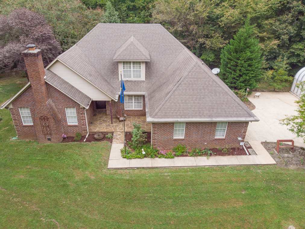 414 Simmons Road Munford, TN 38058 - Photo 2 of 24 Built in 1999 and Gently Lived In, This Home Has 3BR's and 2BA's, Dining Room, 2 Car Garage, Workshop, And Alot Of Unfinished Attic Space.