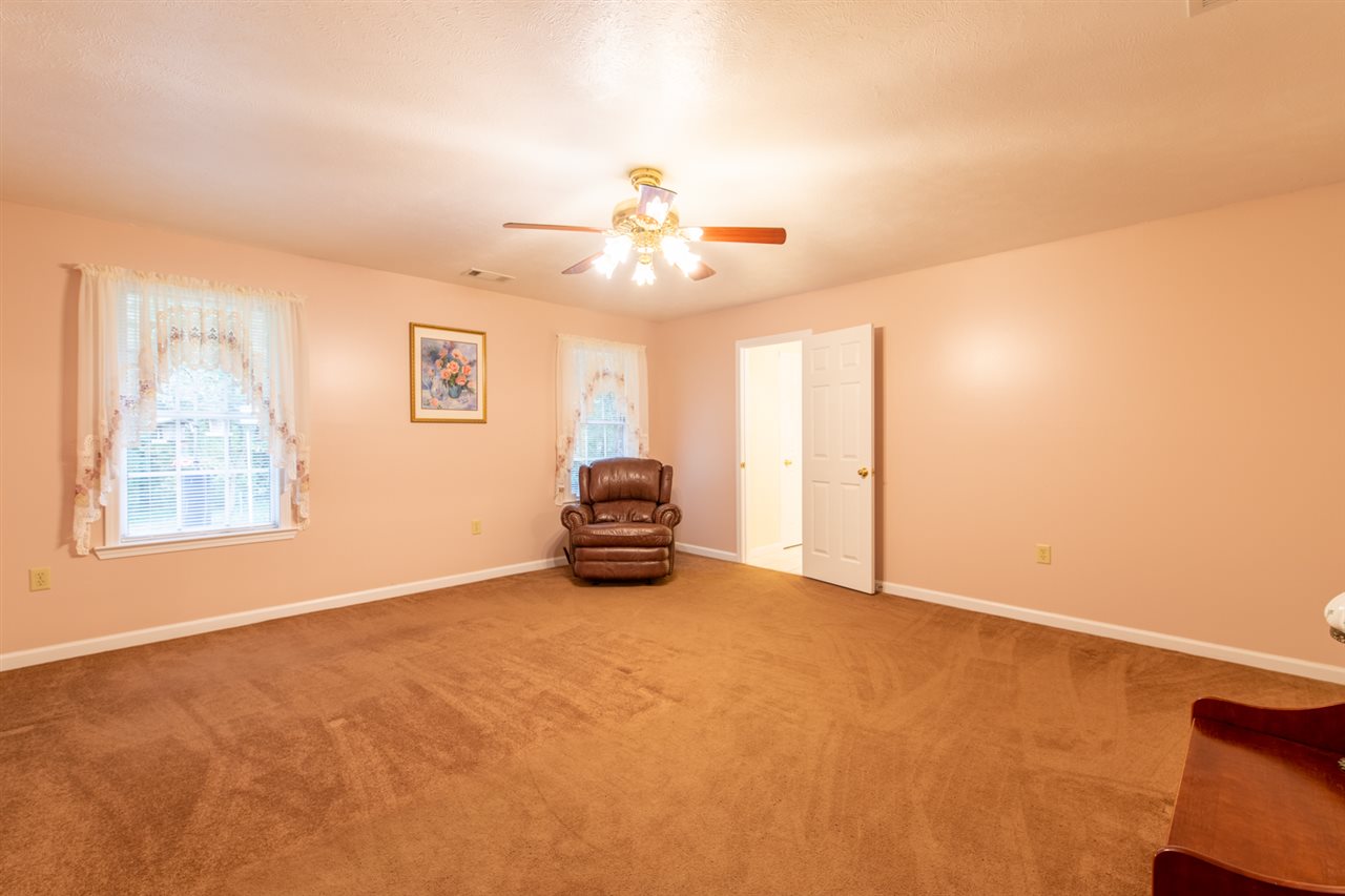 414 Simmons Road Munford, TN 38058 - Photo 11 of 24 Carpeted Master Bedroom, Large His/Her Closets In Master Bath Allows The Bedroom To Be 16x16. Easily Fits An Entire Bedroom Suite.