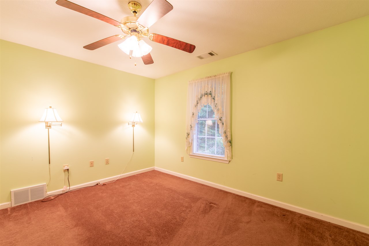 414 Simmons Road Munford, TN 38058 - Photo 17 of 24 Bedroom #3 Is Carpeted And Has A Large Double Door Closet.