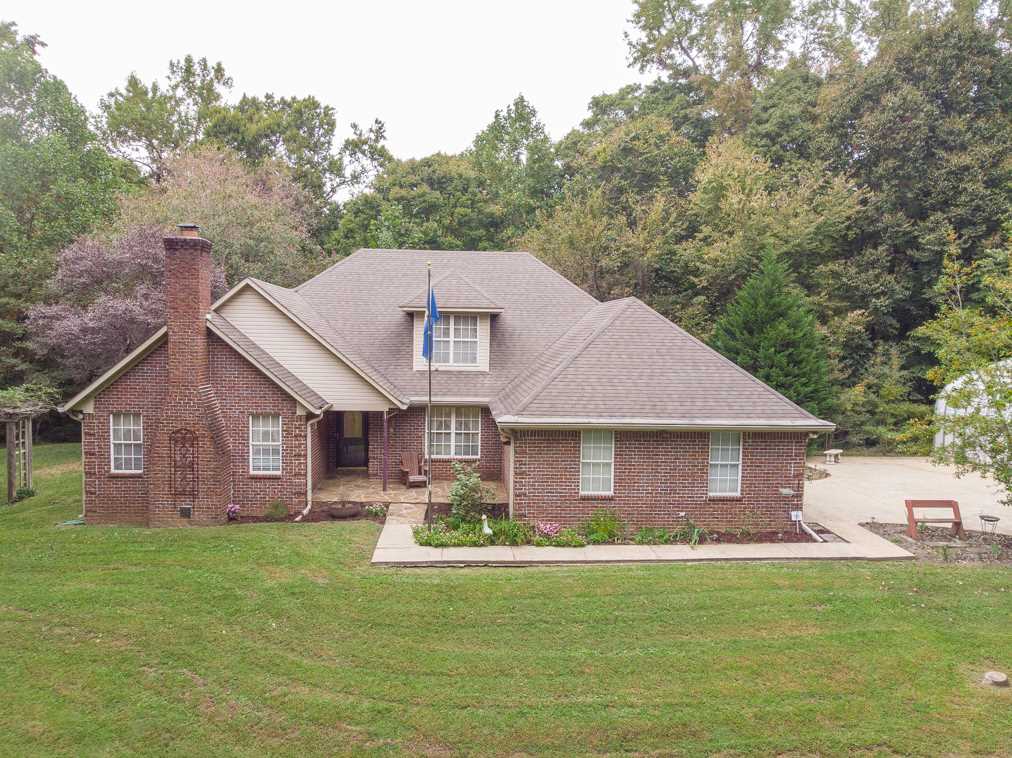 414 Simmons Road Munford, TN 38058 - Photo 3 of 24 All Brick And Vinyl Siding Make This A Low Maintenance Home.