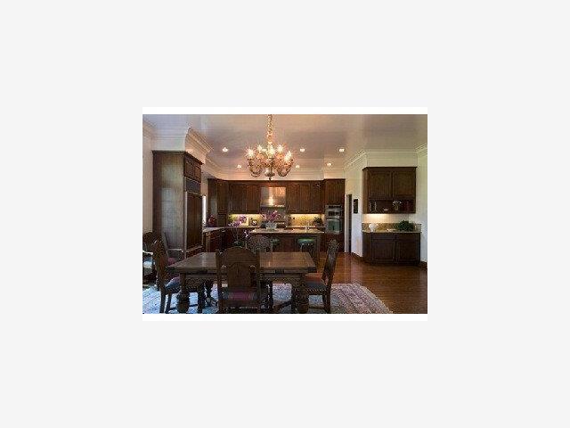 198 Cypress Point Road Half Moon Bay, CA 94019 - Photo 4 of 8 a living room with furniture and a kitchen