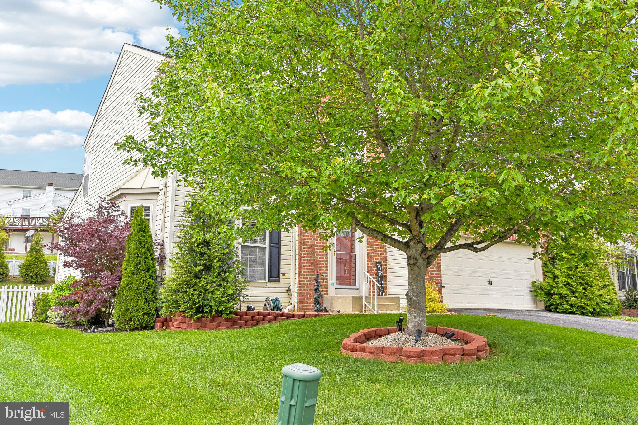 306 Watertons Way Joppa, MD 21085 - Photo 47 of 50 a front view of a house with a garden