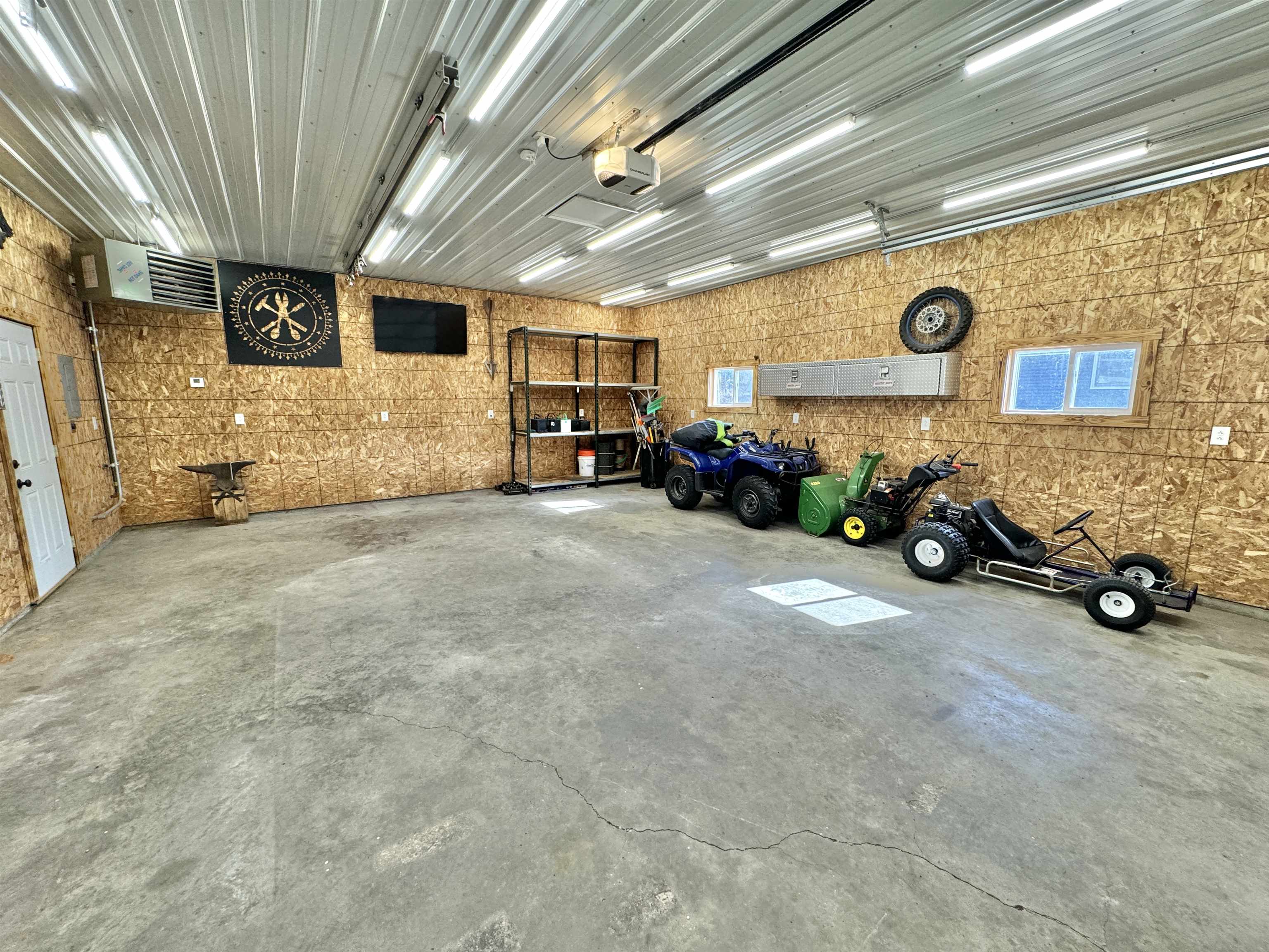 6694 Belvidere Road Roscoe, IL 61073 - Photo 31 of 32 a view of a room with gym equipment