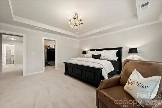 a bathroom with a tub shower and sink