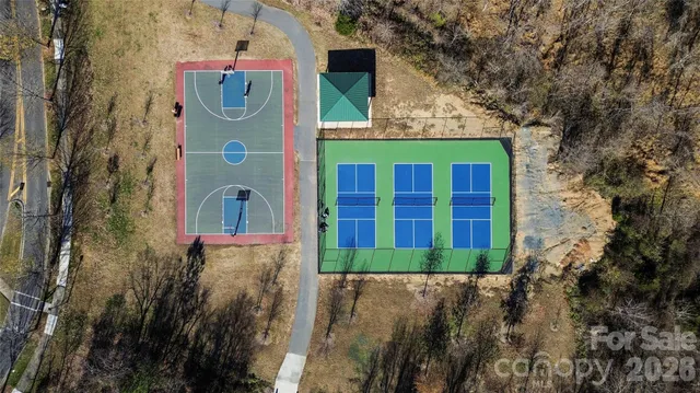 a front view of house with yard outdoor seating and barbeque oven