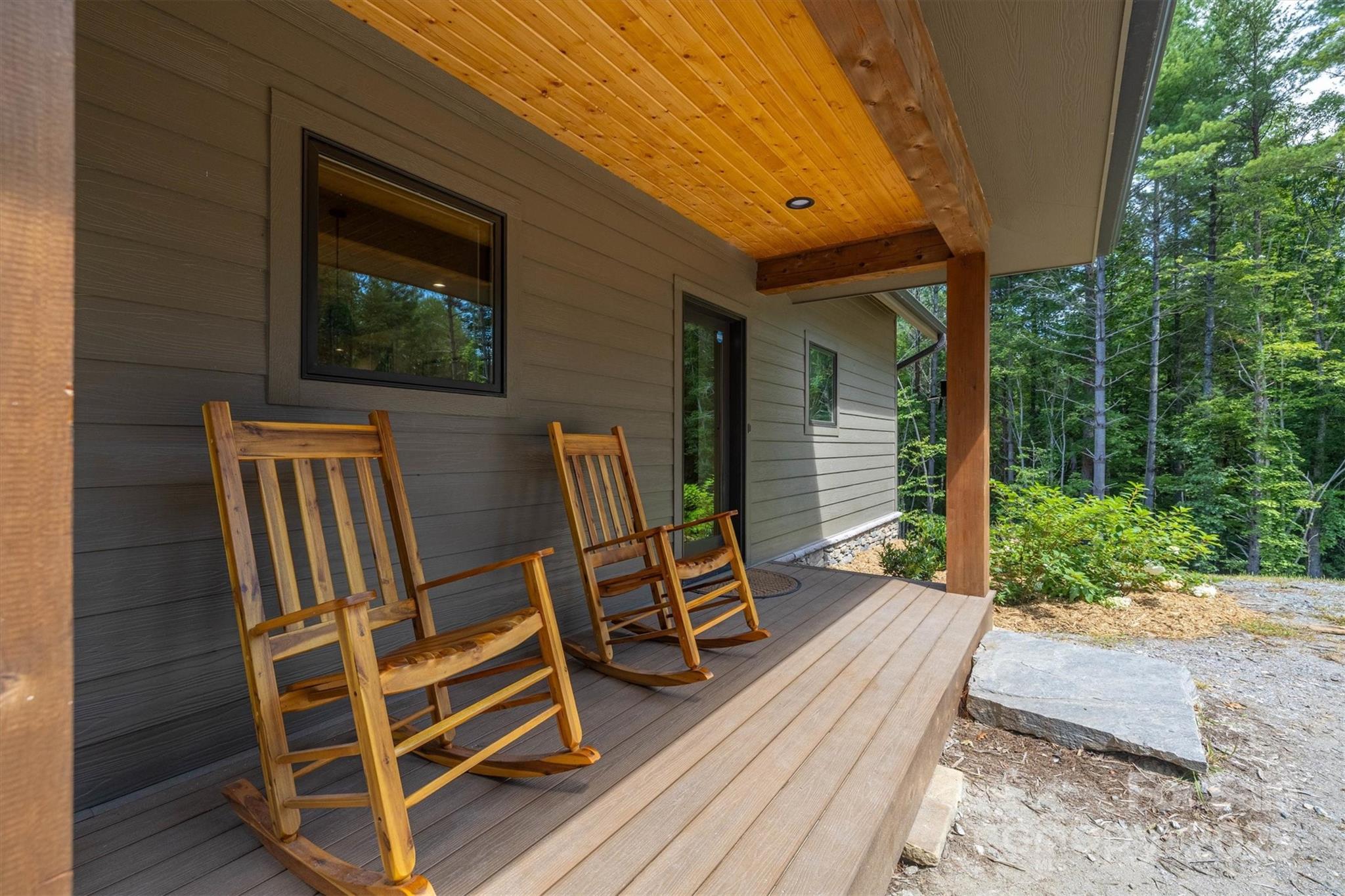 1370 Saylor Way, Unit 8 Nebo, NC 28761 - Photo 16 of 44 a view of a two chairs in the balcony