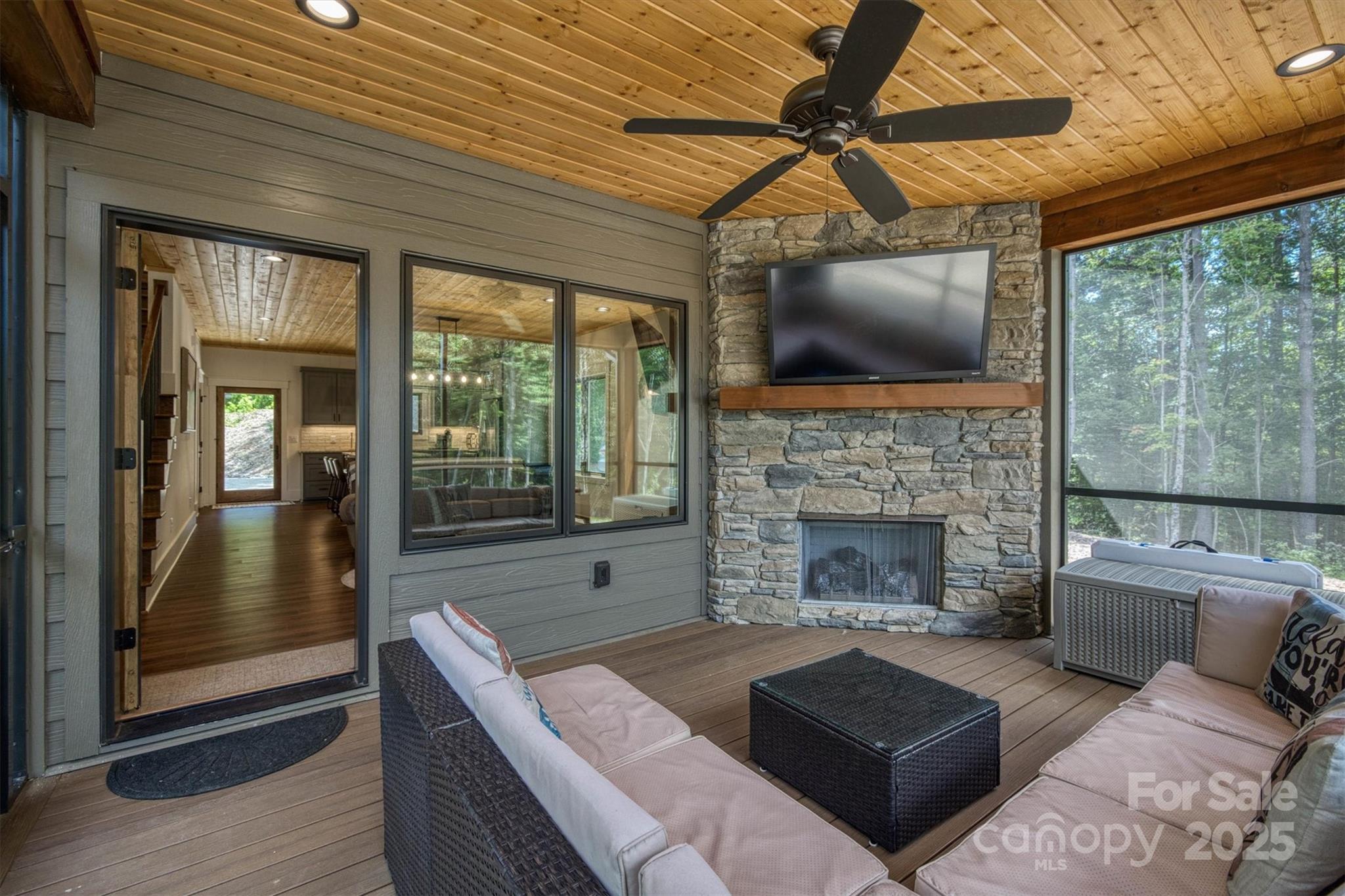 1370 Saylor Way, Unit 8 Nebo, NC 28761 - Photo 25 of 44 a living room with furniture and a fireplace
