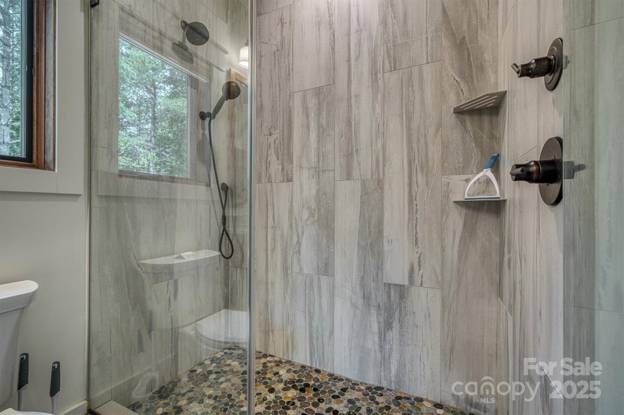 1370 Saylor Way, Unit 8 Nebo, NC 28761 - Photo 33 of 44 a bathroom with a shower and a toilet