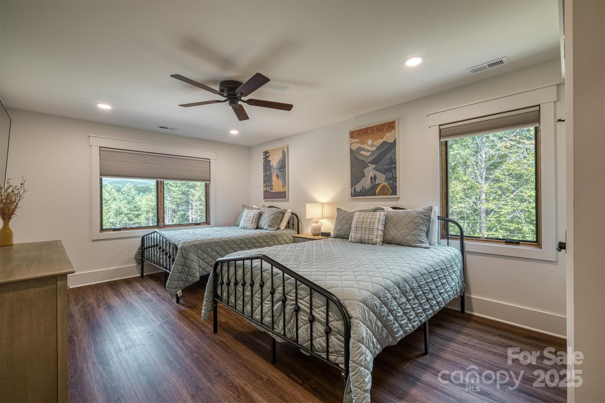 1370 Saylor Way, Unit 8 Nebo, NC 28761 - Photo 43 of 44 a bedroom with a large bed chandelier and a window