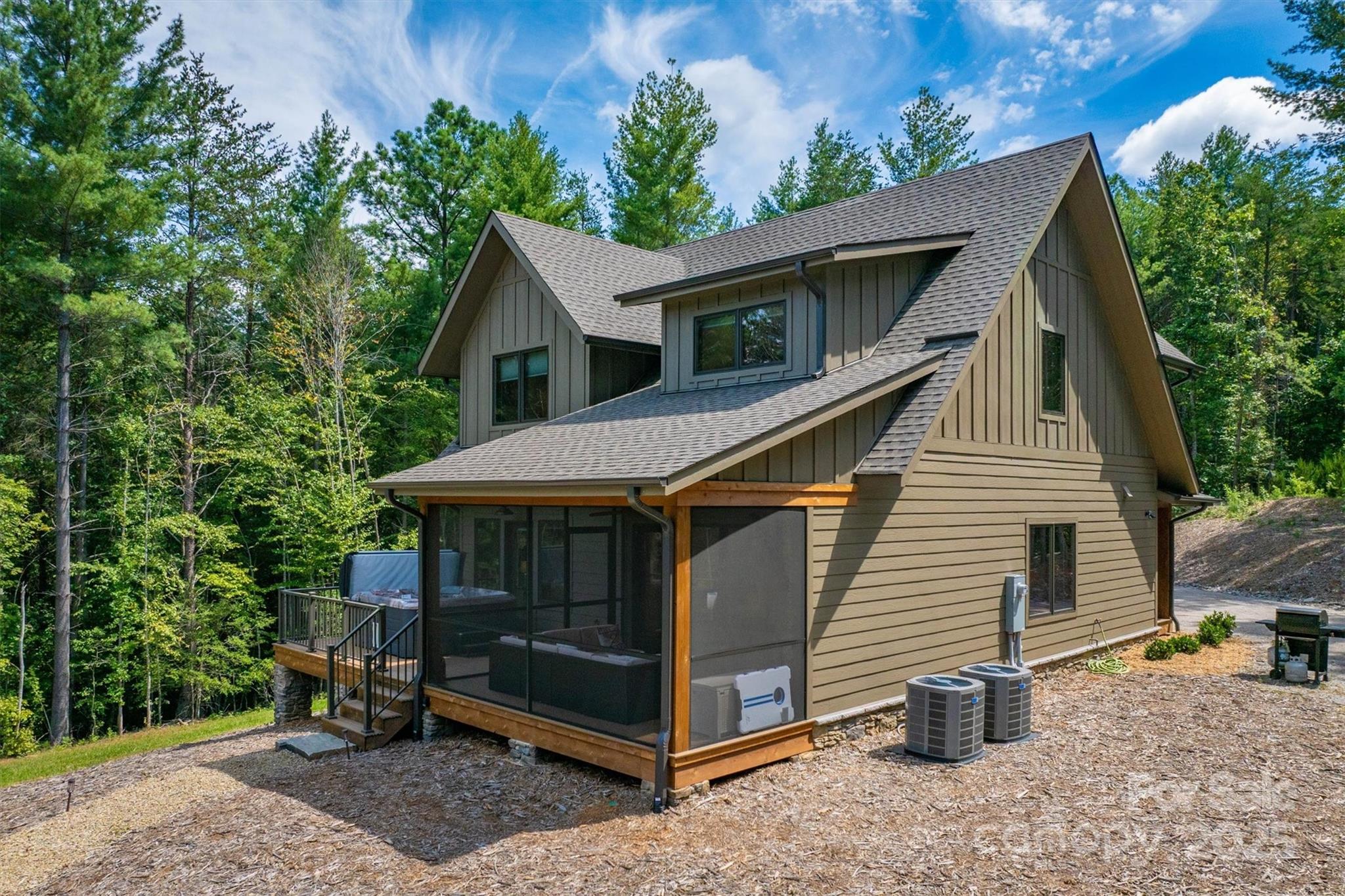 1370 Saylor Way, Unit 8 Nebo, NC 28761 - Photo 7 of 44 a view of small house with a yard and wooden fence