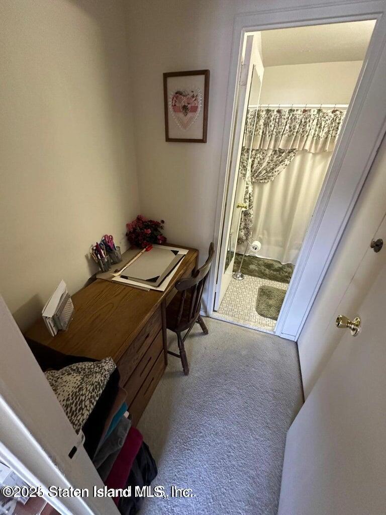 1000 Clove Road, Unit 3F Staten Island, NY 10301 - Photo 7 of 13 a room with furniture and a window