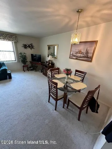 a kitchen with a sink cabinets and appliances