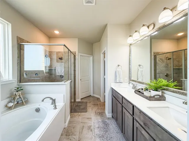 a bathroom with a toilet and a sink