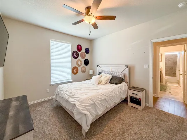 a bathroom with a sink a mirror and a shower