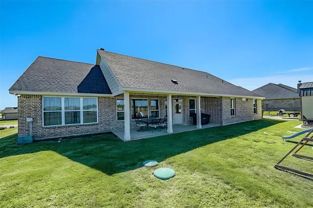 a view of house with outdoor space