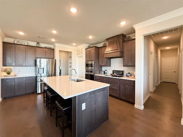 a view of a dining room with furniture and window