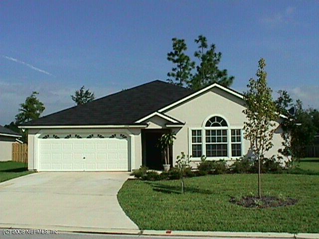 4317 Rye Jacksonville, FL 32259 - Photo 1 of 1 a front view of a house with a yard