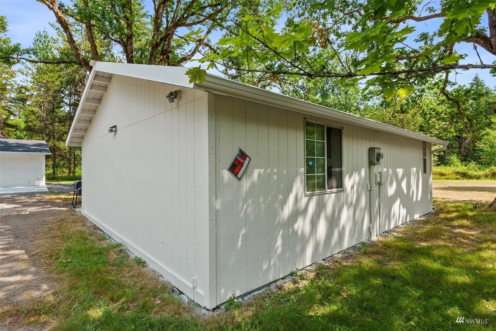 187 Pine Tree Road Toledo, WA 98591 - Photo 16 of 31 a view of a wooden house with a small yard