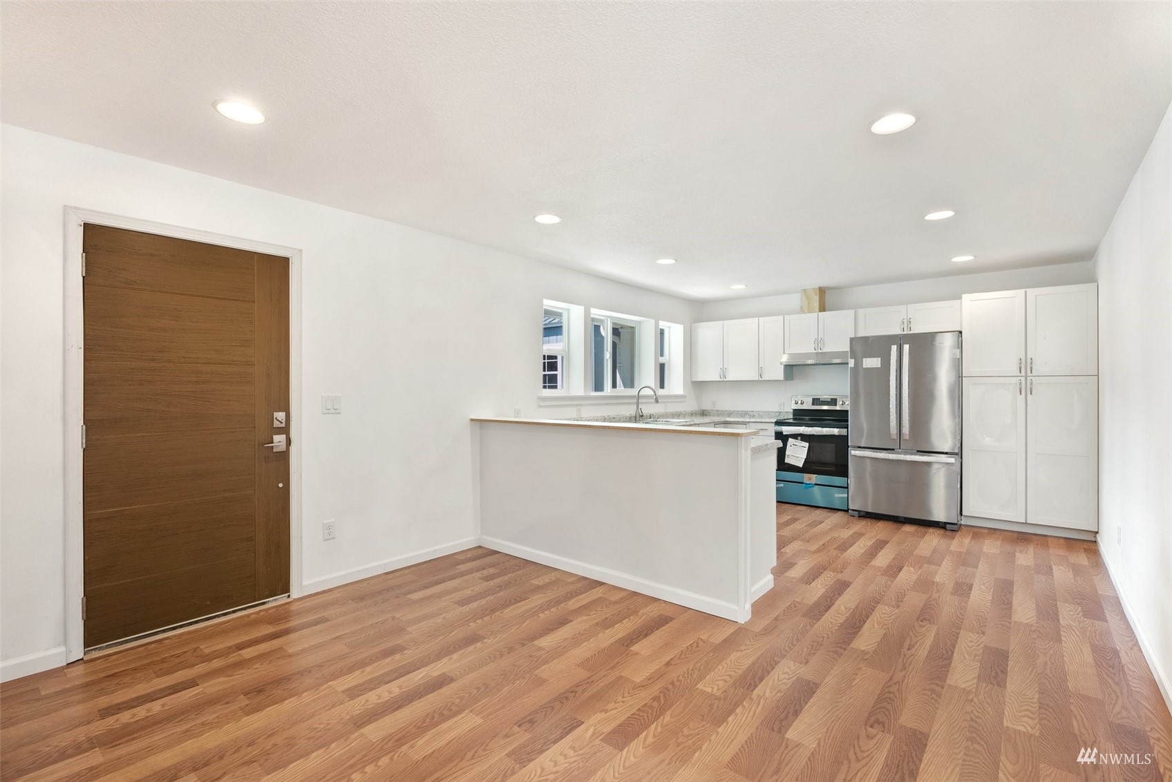 187 Pine Tree Road Toledo, WA 98591 - Photo 8 of 31 a view of kitchen with wooden floor