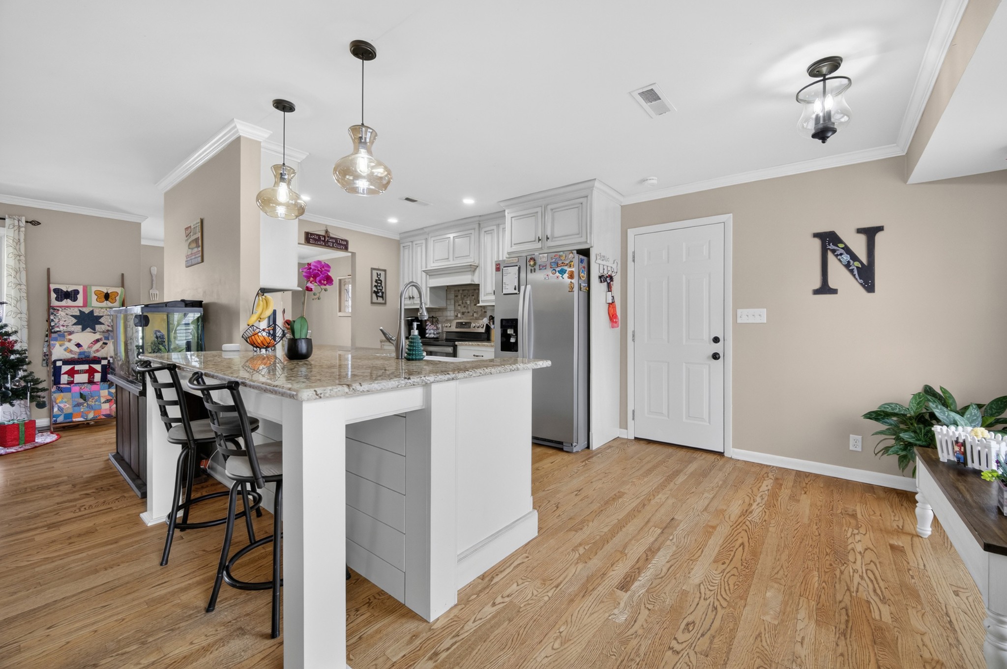 5 Camper Creek Road Fayetteville, TN 37334 - Photo 15 of 51 a kitchen that has a lot of white cabinets and wooden floor