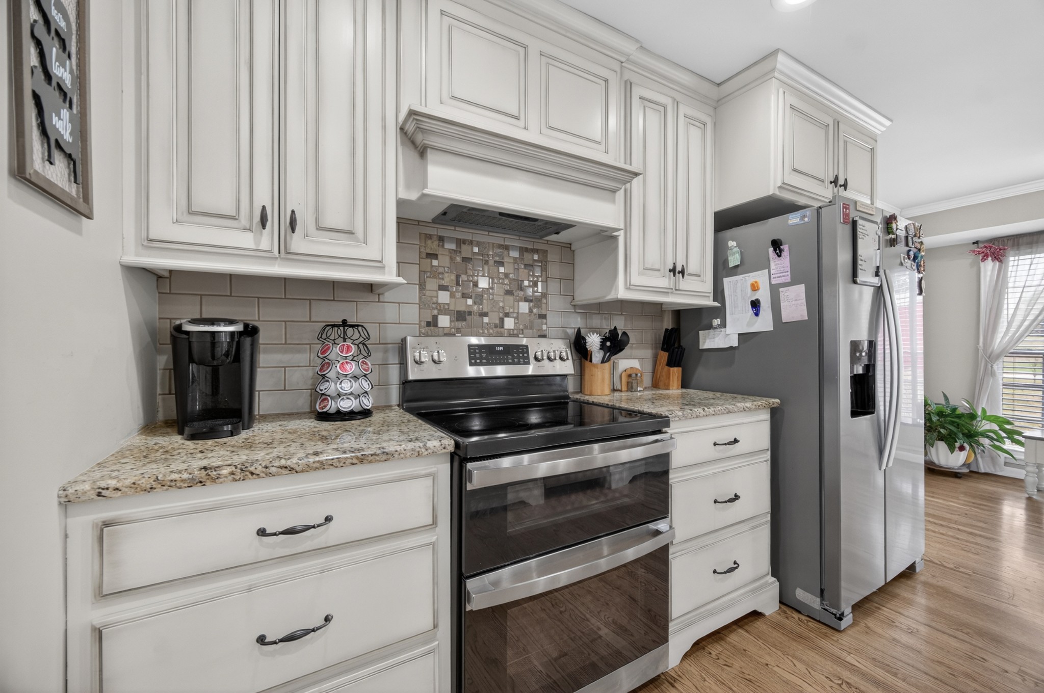 5 Camper Creek Road Fayetteville, TN 37334 - Photo 19 of 51 a kitchen with white cabinets and appliances