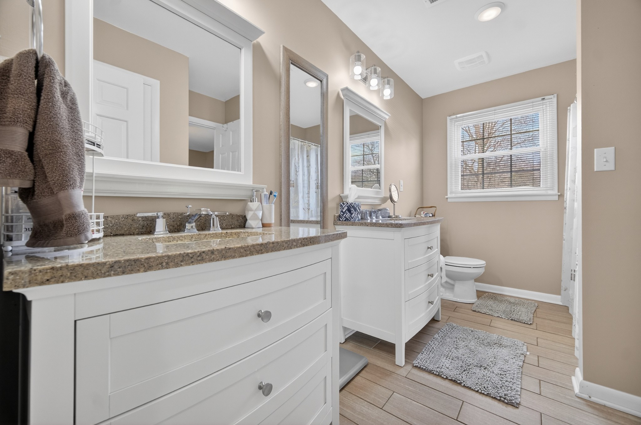 5 Camper Creek Road Fayetteville, TN 37334 - Photo 27 of 51 a bathroom with a granite countertop sink mirror and a toilet