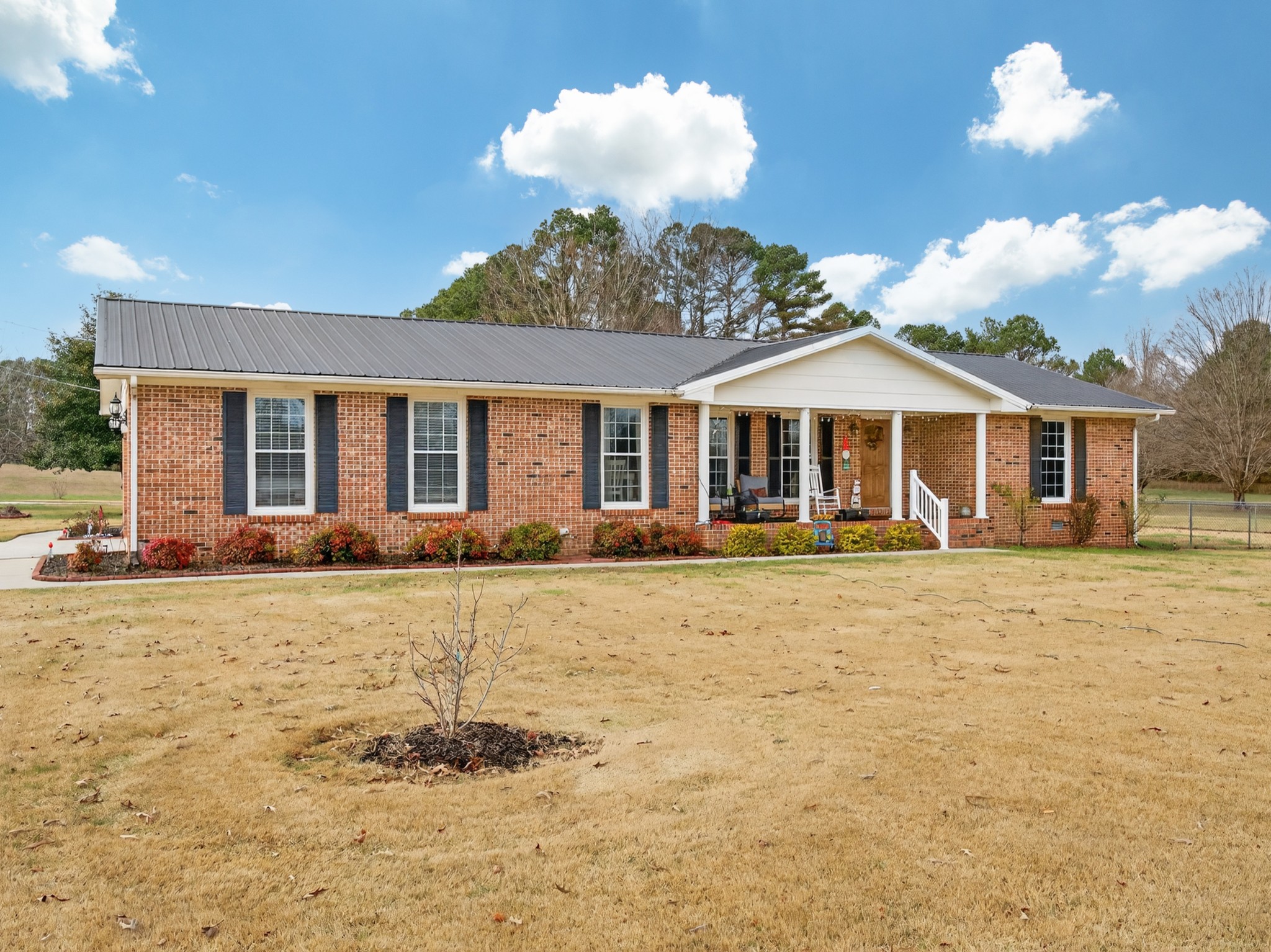 5 Camper Creek Road Fayetteville, TN 37334 - Photo 5 of 51 a front view of a house with a yard and garage