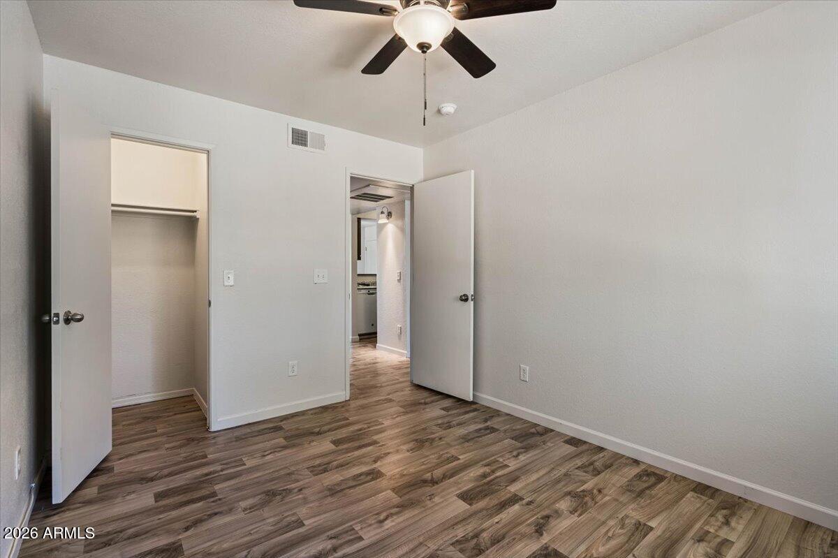 1346 East Mountain View Road, Unit 209 Phoenix, AZ 85020 - Photo 25 of 31 a view of empty room with wooden floor